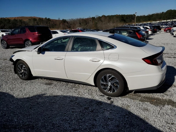 2021 Hyundai Sonata Hybrid Blue with VIN KMHL24JJ8MA030221, listed as a Copart auction lot 84486624 with 77,752 mi miles and Salvage Title. Bid and sale history available at carsss.com. Image 2.