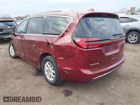 2021 Chrysler Pacifica Touring L with VIN 2C4RC1BG6MR597911, listed as a IAAI auction lot 41660729 with 72,004 mi miles and . Bid and sale history available at DreamBid. Image 3.