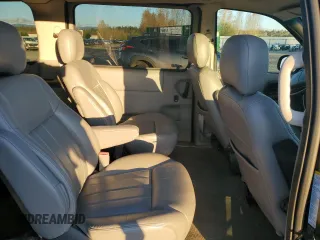1999 Chevrolet Venture z VIN 1GNDX03E6XD330398, wystawiony jako Copart lot #77621004 z przebiegiem 80 625 mil mil oraz Szkody całkowita. Historia ofert i sprzedaży dostępna na DreamBid. Obrazek 11.