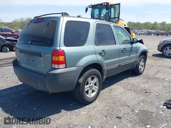 2005 Ford Escape Hybrid z VIN 1FMCU96HX5KC07151, wystawiony jako IAAI lot #42093744 z przebiegiem 275 661 mil mil oraz . Historia ofert i sprzedaży dostępna na DreamBid. Obrazek 4.