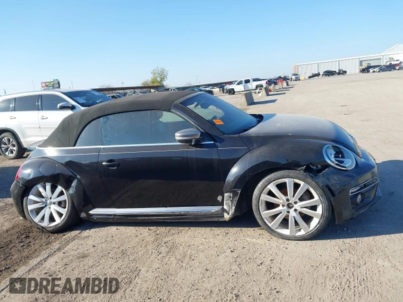 2014 Volkswagen Beetle 1.8T with VIN 3VW517AT4EM815243, listed as a IAAI auction lot 41245346 with 119,259 mi miles and . Bid and sale history available at DreamBid. Image 13.