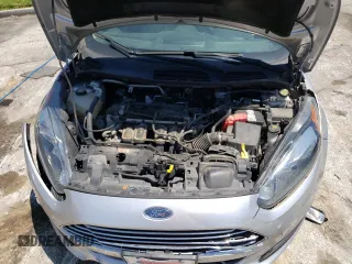 2017 Ford Fiesta S z VIN 3FADP4AJ7HM162072, wystawiony jako Copart lot #58760304 z przebiegiem 122 751 mil mil oraz Szkoda całkowita • Salvage title. Historia ofert i sprzedaży dostępna na DreamBid. Obrazek 11.