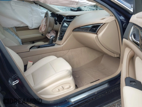2016 Cadillac CTS Luxury Collection AWD with VIN 1G6AX5SX5G0180953, listed as a IAAI auction lot 41005332 with Not Provided miles and . Bid and sale history available at DreamBid. Image 5.