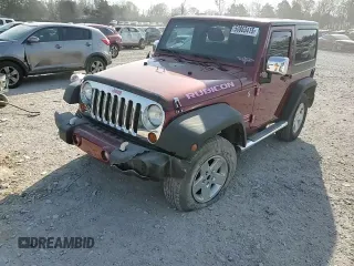 2012 Jeep Wrangler Sport z VIN 1C4AJWAG9CL150787, wystawiony jako Copart lot #50863415 z przebiegiem 68 623 mil mil oraz Szkoda całkowita • Salvage title. Historia ofert i sprzedaży dostępna na DreamBid. Obrazek 11.