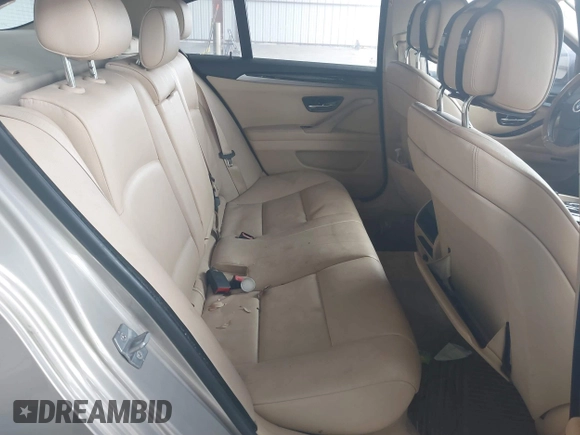 2013 BMW 5 Series 528i with VIN WBAXG5C52DDY35141, listed as a IAAI auction lot 41883031 with 112,917 mi miles and . Bid and sale history available at carsss.com. Image 8.