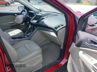 2014 Ford Escape SE with VIN 1FMCU0GX5EUB58169, listed as a IAAI auction lot 42155452 with 89,002 mi miles and . Bid and sale history available at DreamBid. Image 5.