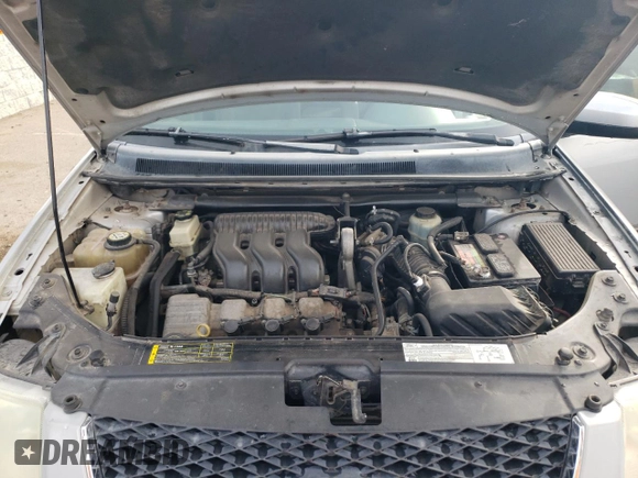 2005 Ford Freestyle SEL z VIN 1FMDK05165GA15433, wystawiony jako Copart lot #87221574 z przebiegiem Nie podano mil oraz Szkoda całkowita • Salvage title. Historia ofert i sprzedaży dostępna na DreamBid. Obrazek 12.