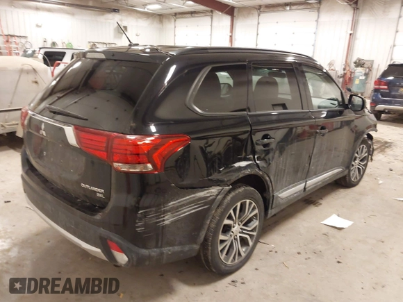 2016 Mitsubishi Outlander SE with VIN JA4AZ3A35GZ037422, listed as a IAAI auction lot 41504909 with 115,242 mi miles and . Bid and sale history available at DreamBid. Image 4.