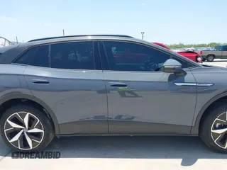2023 Volkswagen ID.4 Pro S z VIN 1V2GNPE80PC006590, wystawiony jako IAAI lot #42178241 z przebiegiem 17 177 mil mil oraz . Historia ofert i sprzedaży dostępna na DreamBid. Obrazek 14.