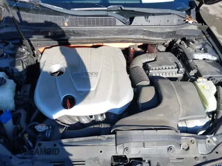 2015 Kia Optima Hybrid with VIN KNAGM4AD3F5088949, listed as a IAAI auction lot 41008816 with 138,921 mi miles. Bid and sale history available at carsss.com. Image 10.