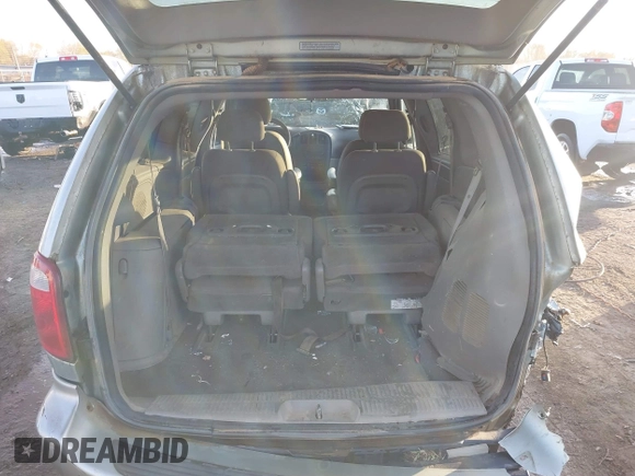 2003 Dodge Grand Caravan with VIN 2D4GP443X3R277421, listed as a IAAI auction lot 41035290 with 243,568 mi miles and . Bid and sale history available at DreamBid. Image 8.