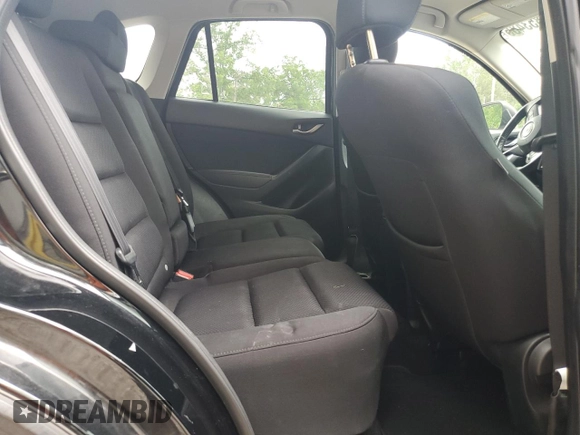 2016 Mazda CX-5 Touring with VIN JM3KE2CY9G0661308, listed as a Copart auction lot 51853485 with 131,595 mi miles and Salvage Title. Bid and sale history available at carsss.com. Image 11.