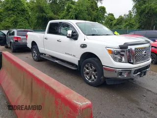 2017 Nissan Titan Pro-4X z VIN 1N6BA1F43HN558166, wystawiony jako IAAI lot #42305516 z przebiegiem 122 765 mil mil oraz . Historia ofert i sprzedaży dostępna na DreamBid. Obrazek 1.
