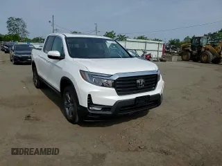 2023 Honda Ridgeline RTL with VIN 5FPYK3F53PB067003, listed as a Copart auction lot 58384895 with 31,983 mi miles and Salvage title. Bid and sale history available at DreamBid. Image 13.