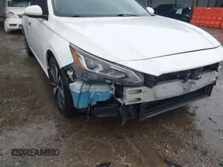 2019 Nissan Altima SV with VIN 1N4BL4DVXKC214904, listed as a IAAI auction lot 42162093 with 294,733 mi miles and . Bid and sale history available at DreamBid. Image 19.