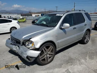2001 Mercedes-Benz M 320/430/500 z VIN 4JGAB54E71A270139, wystawiony jako Copart lot #57175625 z przebiegiem 154 870 mil mil oraz Szkoda całkowita • Salvage title. Historia ofert i sprzedaży dostępna na DreamBid. Obrazek 1.