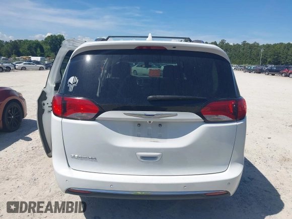 2020 Chrysler Pacifica Touring L z VIN 2C4RC1BG6LR276742, wystawiony jako IAAI lot #42167284 z przebiegiem 123 668 mil mil oraz . Historia ofert i sprzedaży dostępna na DreamBid. Obrazek 16.