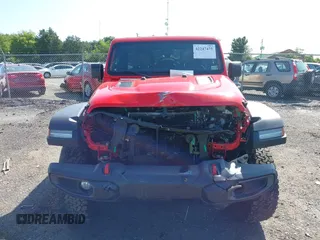 2021 Jeep Wrangler Unlimited Rubicon with VIN 1C4HJXFG2MW575541, listed as a IAAI auction lot 42247475 with 92,353 mi miles and . Bid and sale history available at DreamBid. Image 13.