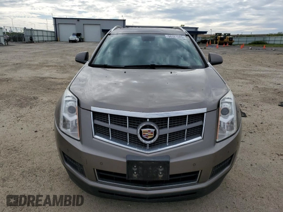 2011 Cadillac SRX Luxury Collection z VIN 3GYFNAEY8BS619208, wystawiony jako Copart lot #58321585 z przebiegiem 176 560 mil mil oraz Nie do naprawy • Non repairable. Historia ofert i sprzedaży dostępna na DreamBid. Obrazek 5.
