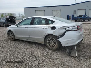 2018 Ford Fusion SE z VIN 3FA6P0H74JR112086, wystawiony jako Copart lot #56630275 z przebiegiem 123 300 mil mil oraz Szkoda całkowita • Salvage title. Historia ofert i sprzedaży dostępna na DreamBid. Obrazek 2.