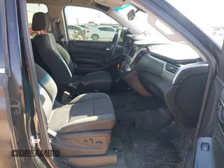 2015 Chevrolet Tahoe Commercial z VIN 1GNLC2EC7FR575386, wystawiony jako IAAI lot #41836137 z przebiegiem 143 231 mil mil oraz . Historia ofert i sprzedaży dostępna na DreamBid. Obrazek 5.