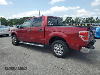 2014 Ford F-150 XL with VIN 1FTFW1CT7EKG41338, listed as a Copart auction lot 60037405 with 128,130 mi miles and Salvage title. Bid and sale history available at DreamBid. Image 2.