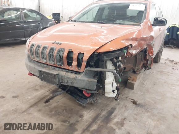 2015 Jeep Cherokee Trailhawk with VIN 1C4PJMBS5FW524462, listed as a IAAI auction lot 41774347 with 107,592 mi miles. Bid and sale history available at carsss.com. Image 6.