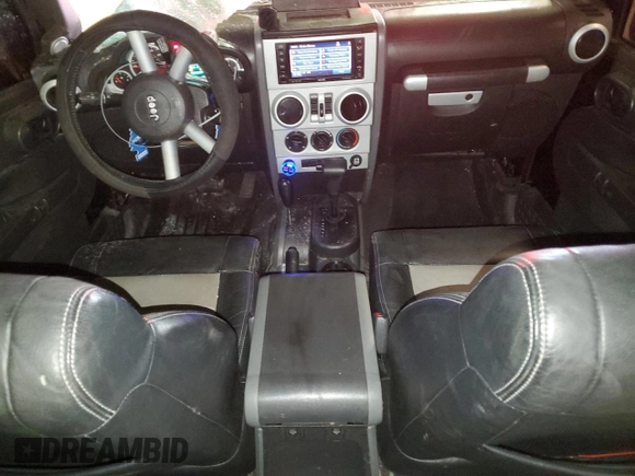 2008 Jeep Wrangler Unlimited Sahara with VIN 1J8GA59118L652519, listed as a Copart auction lot 47089285 with 144,682 mi miles and Non Repairable. Bid and sale history available at carsss.com. Image 8.