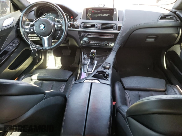 2015 BMW 6 Series 650i xDrive with VIN WBA6B4C55FD761124, listed as a Copart auction lot 50559555 with 49,735 mi miles and Salvage Title. Bid and sale history available at DreamBid. Image 8.