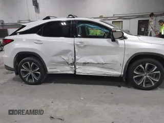 2020 Lexus RX with VIN 2T2HGMDA9LC043542, listed as a IAAI auction lot 41498131 with 63,689 mi miles. Bid and sale history available at carsss.com. Image 6.