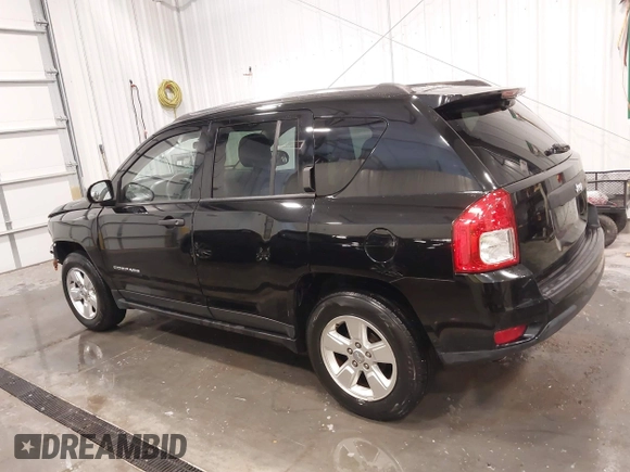 2014 Jeep Compass Sport with VIN 1C4NJCBA3ED777881, listed as a IAAI auction lot 41845518 with 113,566 mi miles. Bid and sale history available at carsss.com. Image 15.