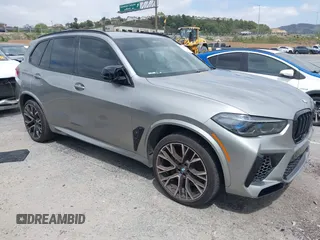 2022 BMW X5 M with VIN 5YMJU0C00N9M59253, listed as a IAAI auction lot 41476833 with 27,813 mi miles. Bid and sale history available at carsss.com. Image 1.