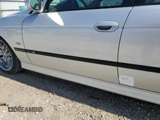 2000 BMW M5 z VIN WBSDE9342YBZ96884, wystawiony jako Copart lot #81061134 z przebiegiem 144 475 mil mil oraz Nie do naprawy • Non repairable. Historia ofert i sprzedaży dostępna na DreamBid. Obrazek 12.