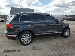 2017 Volkswagen Touareg Sport with VIN WVGEF7BP2HD000699, listed as a Copart auction lot 47234685 with Not Provided miles and Salvage Title. Bid and sale history available at DreamBid. Image 3.