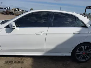 2014 Mercedes-Benz E 350 Sport z VIN WDDHF5KB7EA877606, wystawiony jako IAAI lot #41600100 z przebiegiem 99 682 mil mil oraz . Historia ofert i sprzedaży dostępna na DreamBid. Obrazek 15.