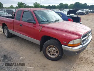 1999 Dodge Dakota SLT z VIN 1B7GL22X4XS151451, wystawiony jako IAAI lot #42250905 z przebiegiem 132 152 mil mil oraz . Historia ofert i sprzedaży dostępna na DreamBid. Obrazek 1.