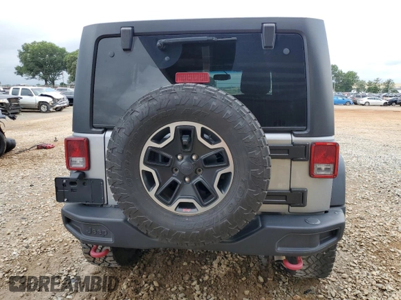 2017 Jeep Wrangler Unlimited Rubicon с VIN 1C4HJWFG9HL578146, выставлен на аукционе Copart как лот 60255635 с пробегом 103 592 миль миль и Списание • Salvage title. История ставок и продаж доступна на DreamBid. Изображение 6.