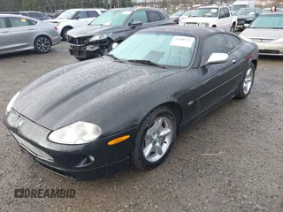 1997 Jaguar XK with VIN SAJGX5741VC004596, listed as a IAAI auction lot 41588751 with 188,607 mi miles and . Bid and sale history available at DreamBid. Image 2.