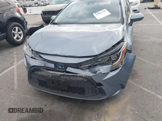 2022 Toyota Corolla Hybrid LE with VIN JTDEAMDE4NJ041913, listed as a IAAI auction lot 41883490 with 23,063 mi miles. Bid and sale history available at carsss.com. Image 6.
