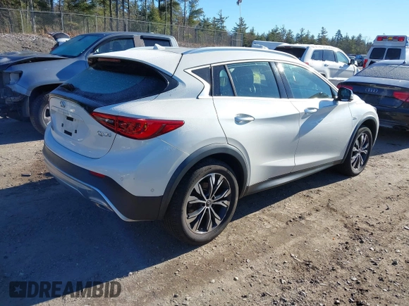 2018 Infiniti QX30 Luxury with VIN SJKCH5CR0JA056820, listed as a IAAI auction lot 40974821 with 71,902 mi miles and . Bid and sale history available at DreamBid. Image 4.