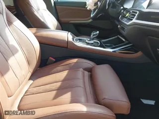 2022 BMW X7 M50i with VIN 5UXCX6C03N9M51772, listed as a IAAI auction lot 41780026 with 26,001 mi miles. Bid and sale history available at carsss.com. Image 5.