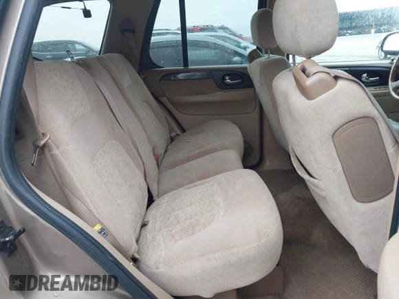 2003 GMC Envoy SLE with VIN 1GKDT13S332264984, listed as a IAAI auction lot 41523191 with 227,004 mi miles. Bid and sale history available at carsss.com. Image 8.