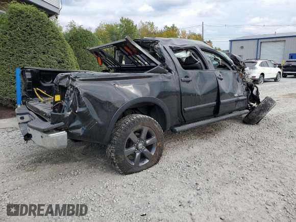 2015 Nissan Titan SL with VIN 1N6AA0EC5FN506114, listed as a Copart auction lot 74430454 with Not Provided miles and Salvage Title. Bid and sale history available at carsss.com. Image 3.