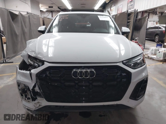 2023 Audi Q5 S line Premium Plus with VIN WA1EAAFYXP2061578, listed as a IAAI auction lot 42338898 with 20,190 mi miles and . Bid and sale history available at DreamBid. Image 12.