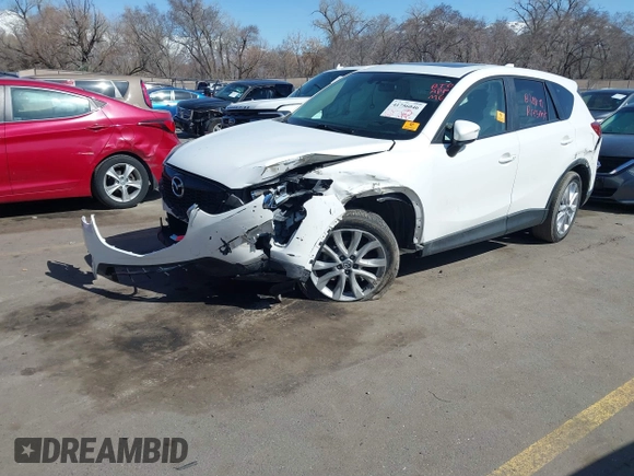 2015 Mazda CX-5 Grand Touring with VIN JM3KE4DY5F0526335, listed as a IAAI auction lot 41756046 with 1 mi miles. Bid and sale history available at carsss.com. Image 2.
