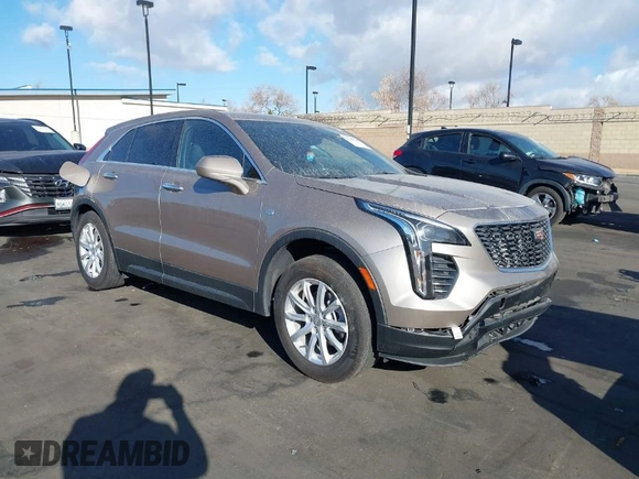 2023 Cadillac XT4 FWD Luxury z VIN 1GYAZAR40PF135132, wystawiony jako IAAI lot #41684609 z przebiegiem 12 164 mil mil oraz . Historia ofert i sprzedaży dostępna na DreamBid. Obrazek 1.