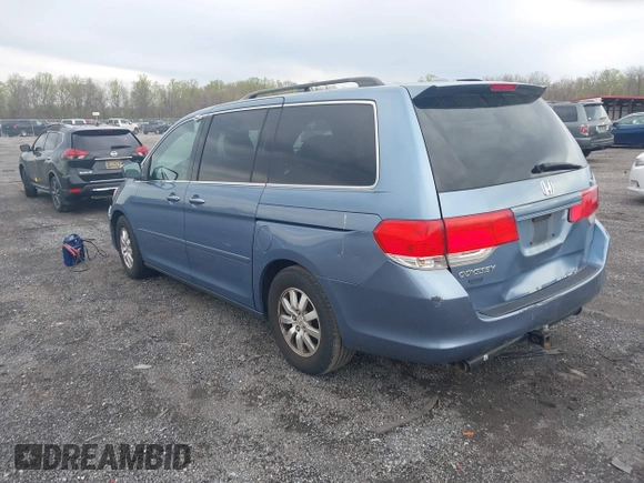 2008 Honda Odyssey EX-L with VIN 5FNRL38748B038328, listed as a IAAI auction lot 42028968 with 243,185 mi miles. Bid and sale history available at carsss.com. Image 3.
