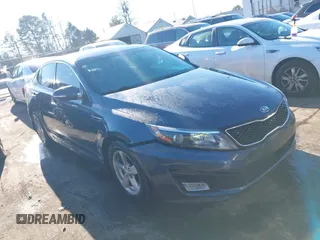 2015 Kia Optima LX with VIN KNAGM4A72F5543977, listed as a IAAI auction lot 41328035 with 153,805 mi miles and . Bid and sale history available at DreamBid. Image 1.