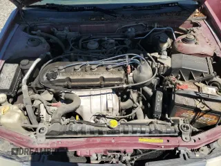 1995 Nissan Altima XE z VIN 1N4BU31D8SC164328, wystawiony jako Copart lot #65999624 z przebiegiem 196 247 mil mil oraz Szkoda całkowita • Salvage title. Historia ofert i sprzedaży dostępna na DreamBid. Obrazek 11.