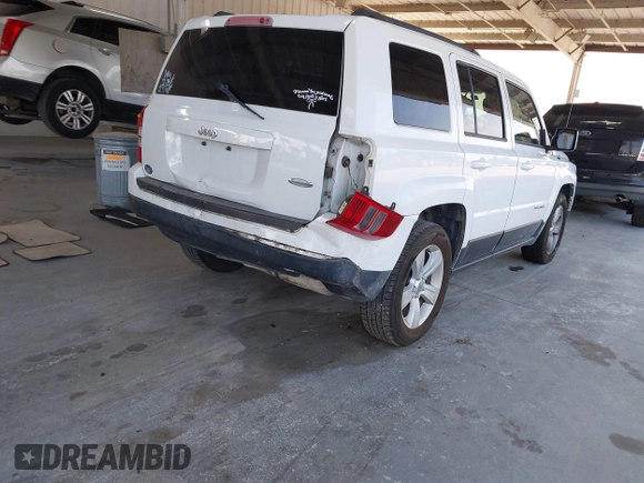 2014 Jeep Patriot High Altitude with VIN 1C4NJPFA1ED653402, listed as a IAAI auction lot 42371410 with 165,459 mi miles and . Bid and sale history available at DreamBid. Image 4.